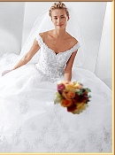 White bridal gown with burnished flower color tones