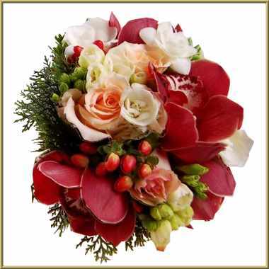 Scarlet, red, green winter bouquet with berries.