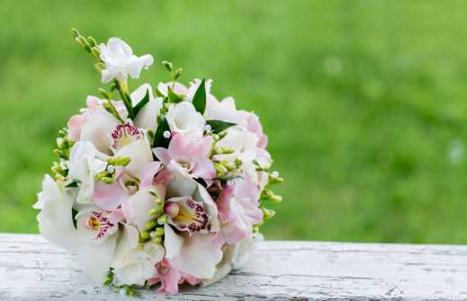 Beatiful brides bouquet lavender orchid and pearl