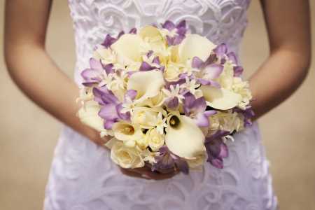 Bridal bouquet calla, cream lily, lavender orchids