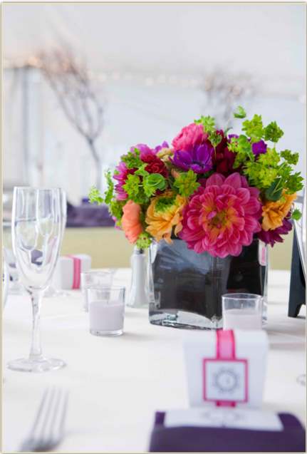 Colorful wedding flowers table centerpiece