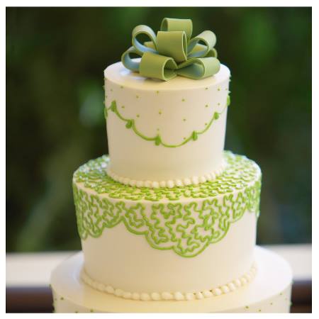 White wedding cake trimmed in green