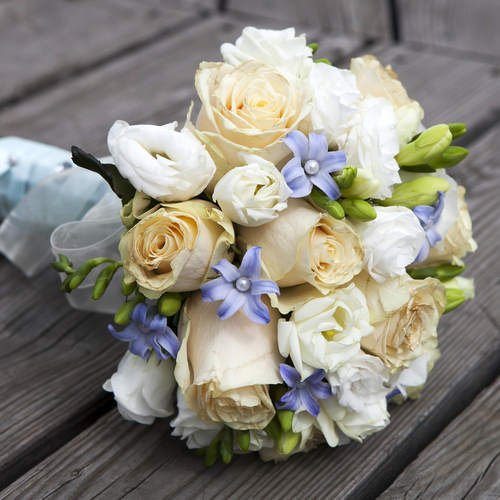 Pale yellow rose and lavender bridal bouquet