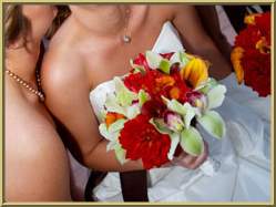 Orange, yellow and green orchid bridal bouquet