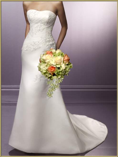 tulle overlays the strapless wedding gown